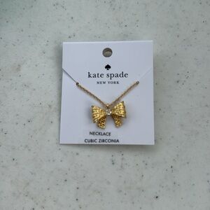Kate Spade gold Wrapped in a Bow cubic zirconia necklace. NWT.